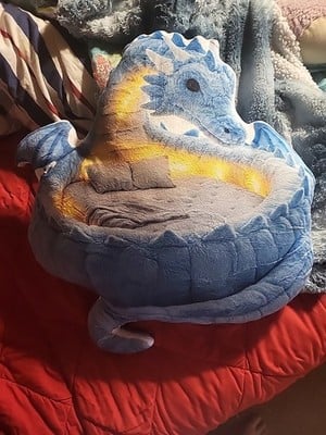 Real photo of the Giant Ice Dragon flat plush shaped pillow