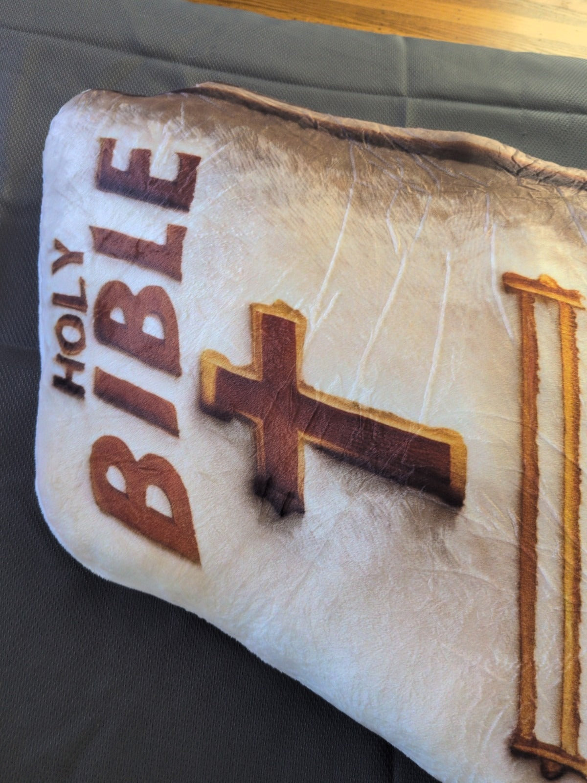 Customer photo (flagged for review) of Christian Holy Bible Shaped Plush Pillow
