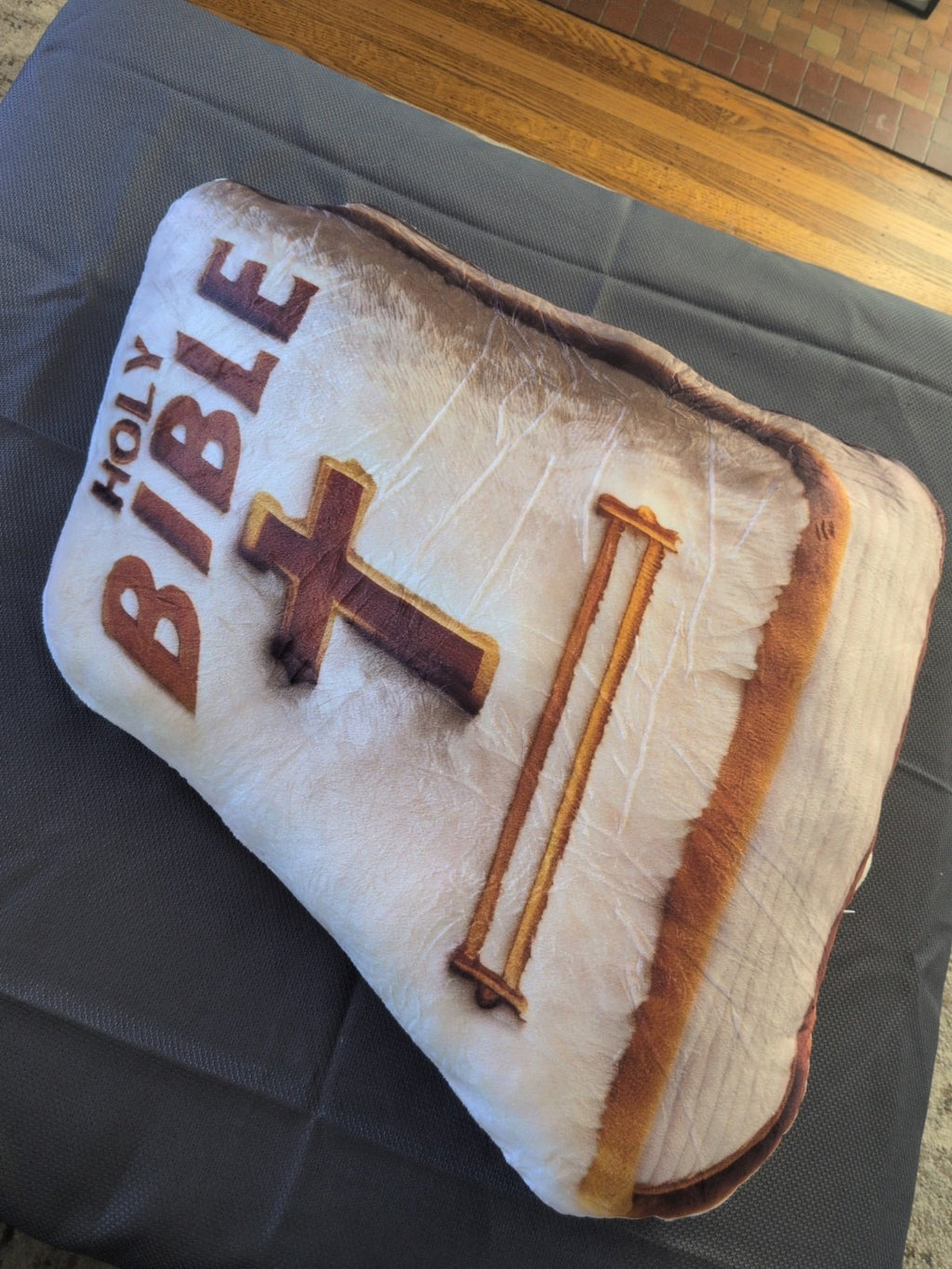 Customer photo (flagged for review) of Christian Holy Bible Shaped Plush Pillow