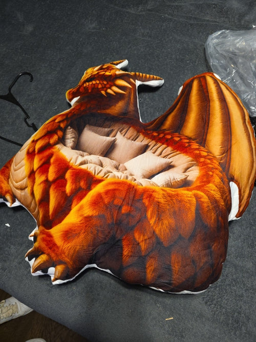 Customer photo of the Giant Amber Dragon flat plush shaped pillow