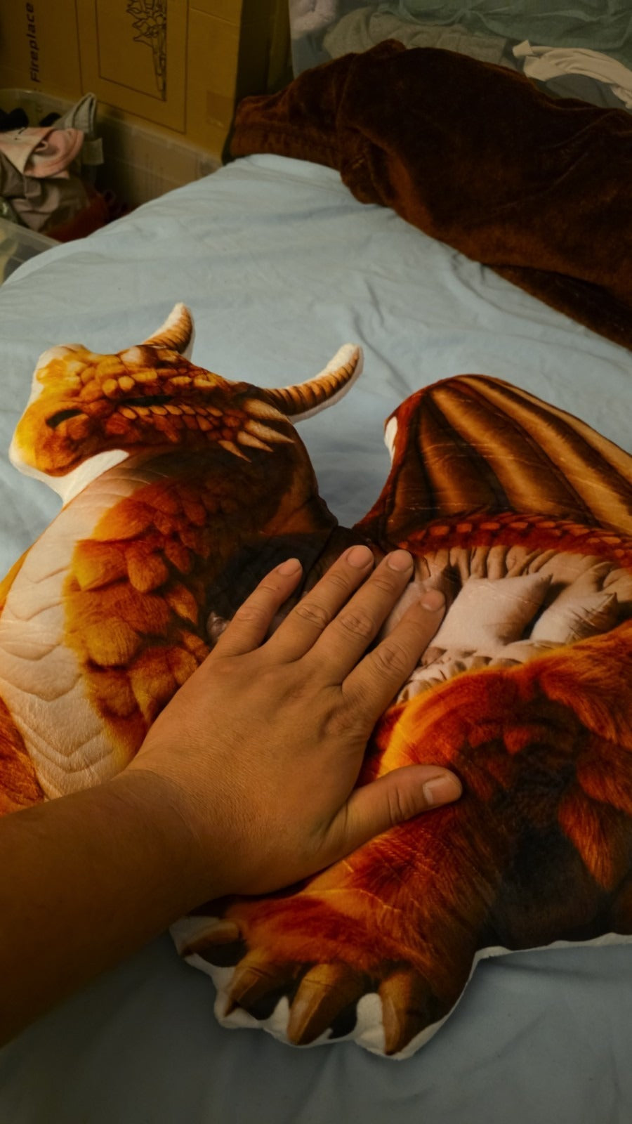 Customer photo of the Giant Amber Dragon flat plush shaped pillow
