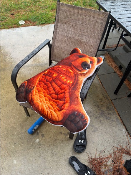 Customer photo (flagged for review) of the Giant Brown Bear Cave flat plush shaped pillow