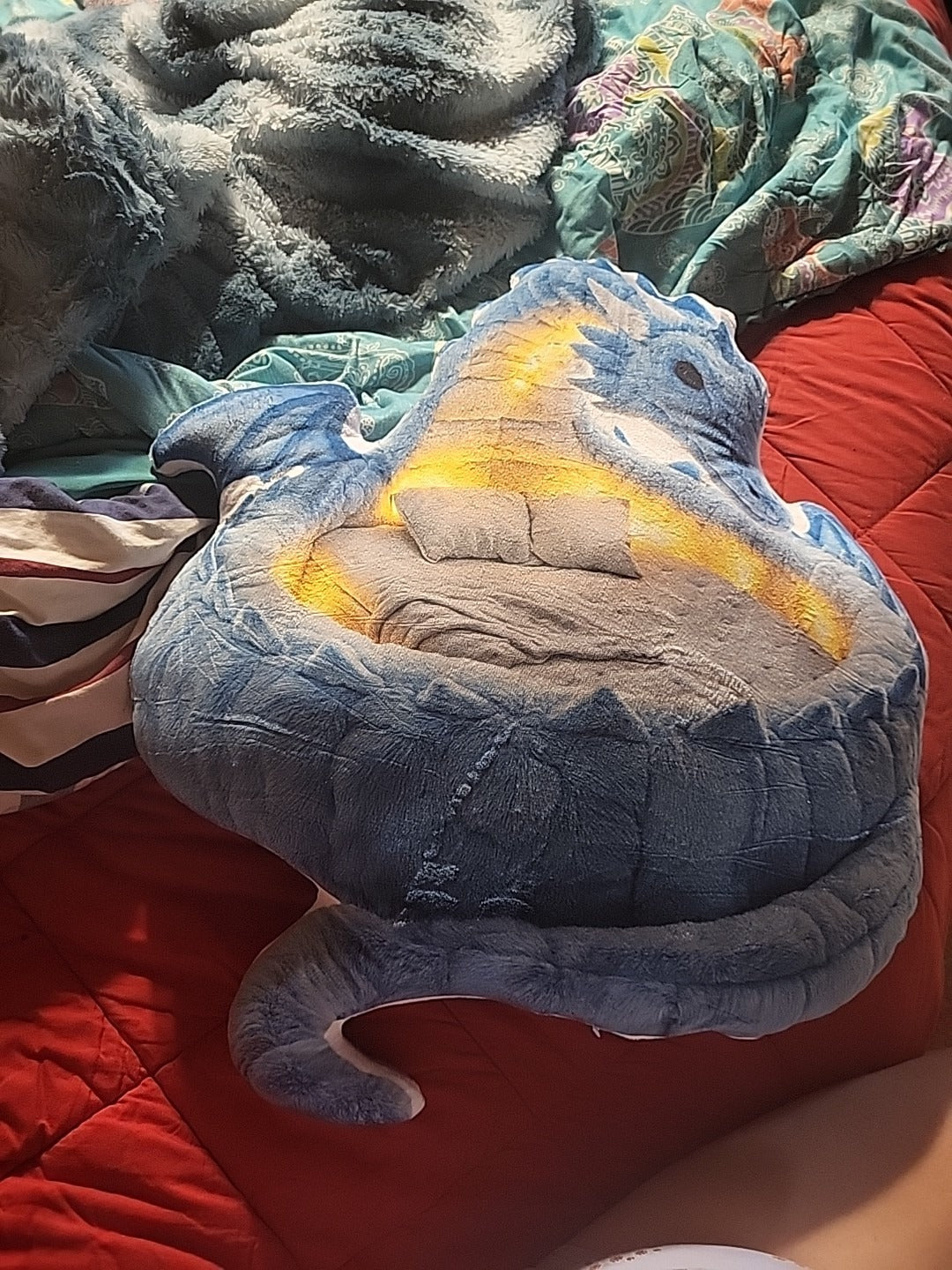 Customer photo of the Giant Ice Dragon flat plush shaped pillow
