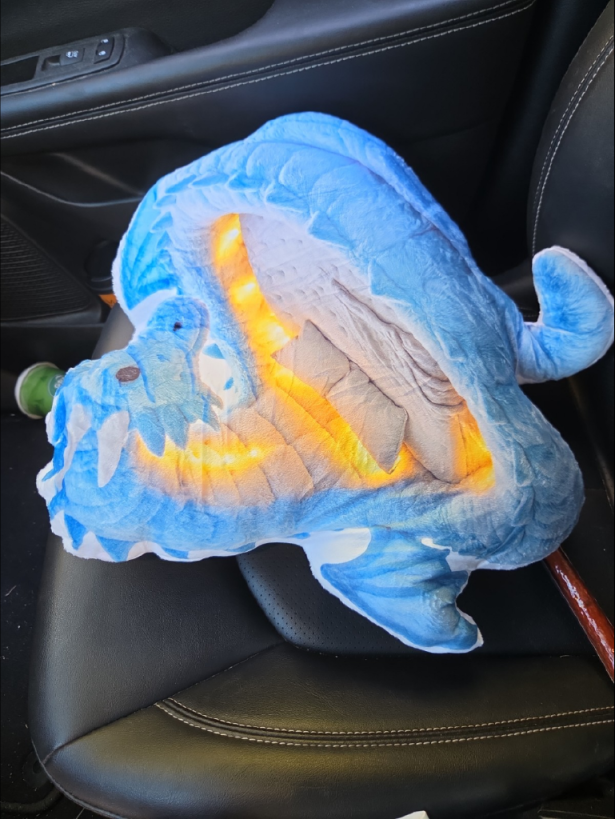Customer photo of the Giant Ice Dragon flat plush shaped pillow