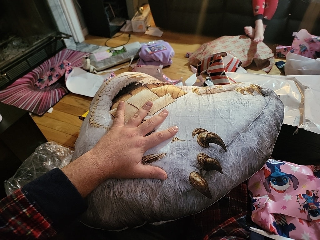 Customer photo of the Giant Mythical Dragon flat plush shaped pillow