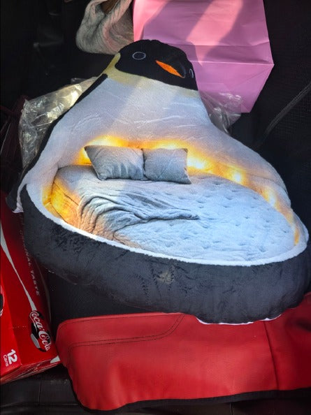 Customer photo of the Giant Penguin flat plush shaped pillow