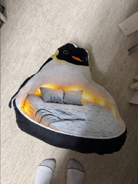 Customer photo of the Giant Penguin flat plush shaped pillow