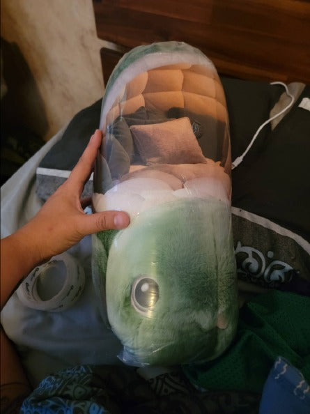 Customer photo (flagged for review) of the Giant Turtle Shell flat plush shaped pillow