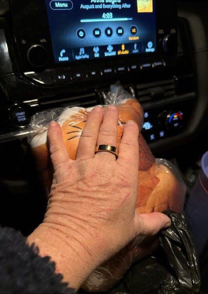 Customer photo (flagged for review) of the Orange Cat flat plush shaped pillow