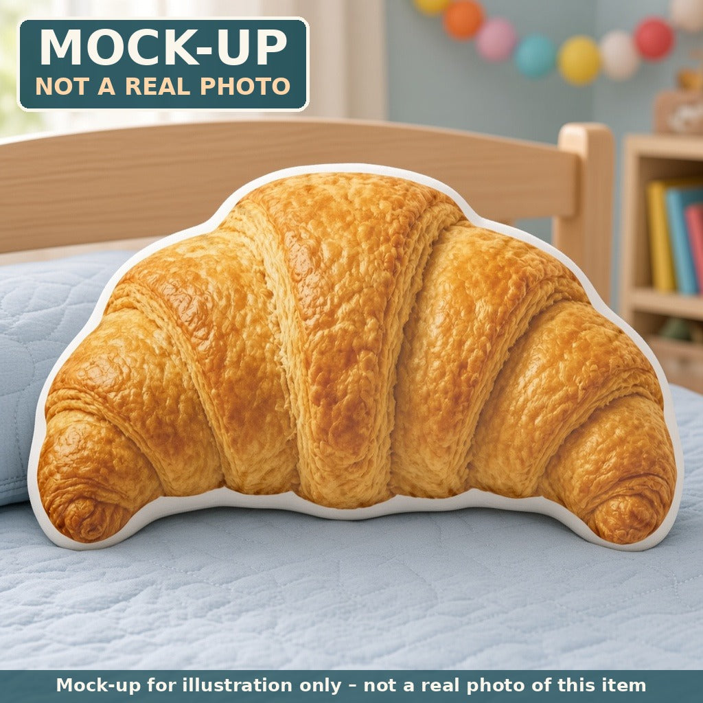 Mock-up (not a real photo): Butter Croissant Pillow – Shaped Plush Throw Pillow shown in a home setting