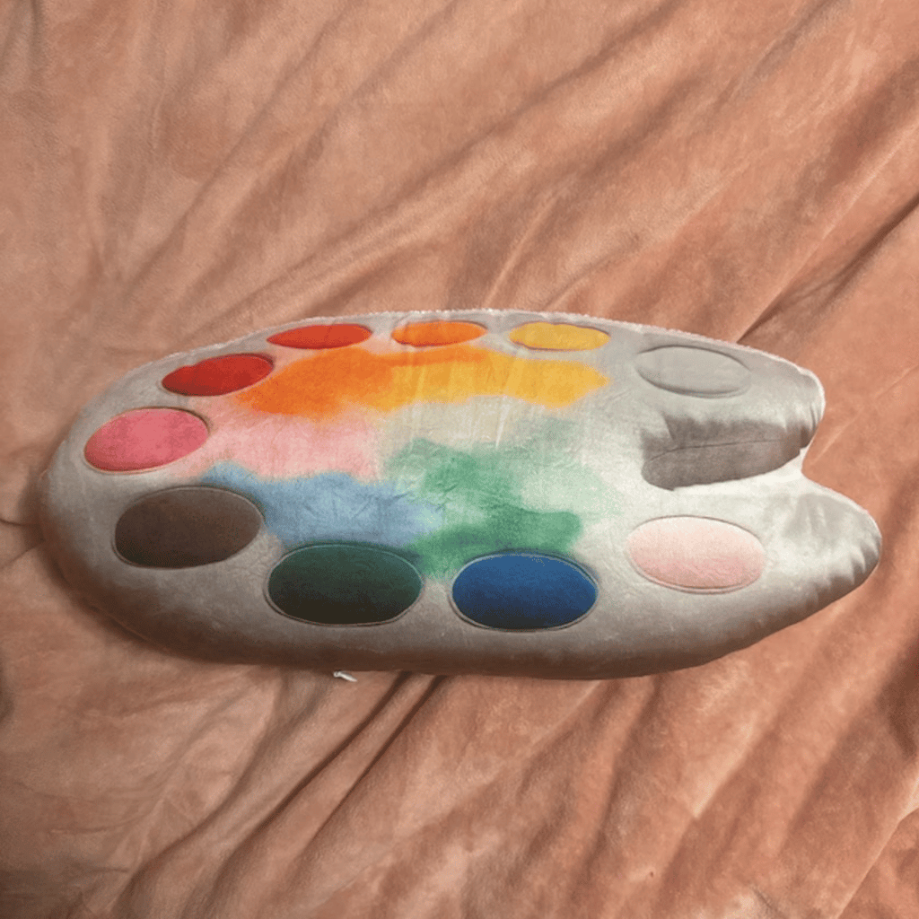 Real photo of the Paint Palette Shaped Plush Pillow